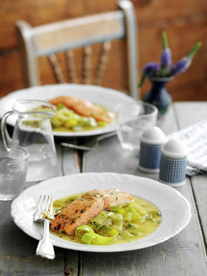 Salmon In A Ginger And Lemon Sauce On A Bed Of Leek Photograph by Gareth Morgans