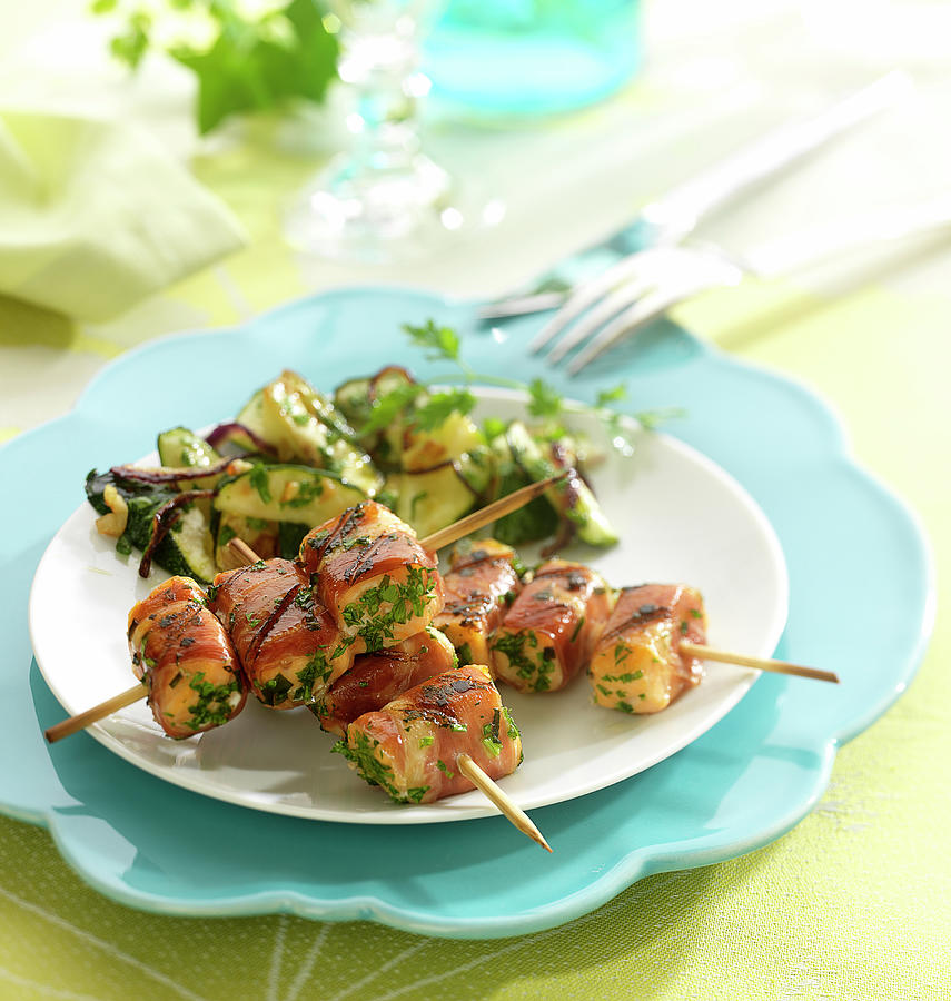 Salmon, Raw Ham And Flat Parsley Brochettes, Pan-fried Courgettes With Garlic Photograph by Bertram