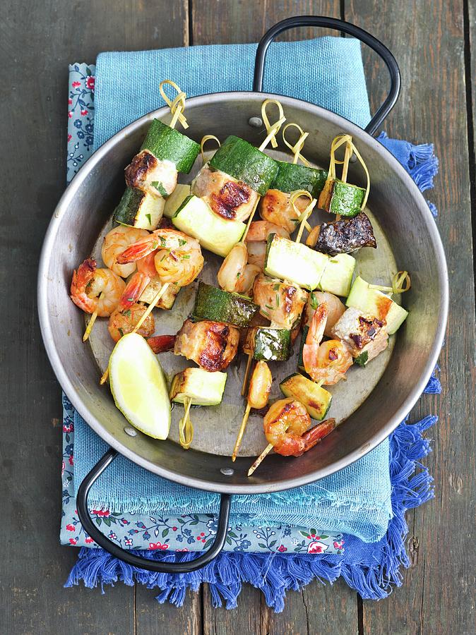 Salmon Skewers With Courgettes And Prawns Photograph by Rua Castilho