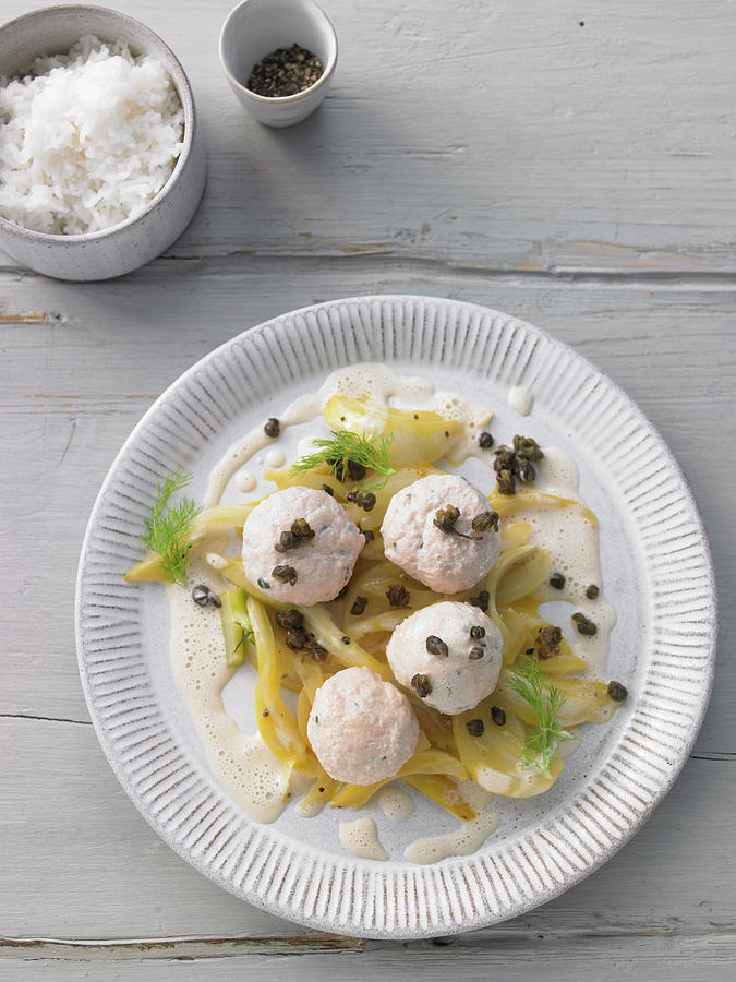 Salmon Trout Dumplings With Lime Butter And Capers Photograph by Jan-peter Westermann / Stockfood Studios