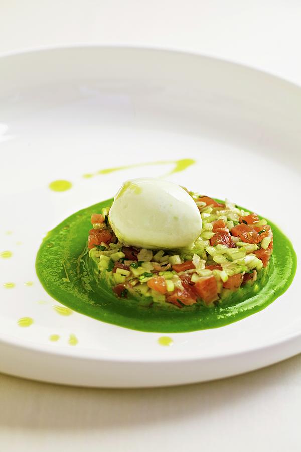 Salmon Trout Tartar With Fennel And Cucumber Served On A Bed Of Young Peas With Lemon Balm Ice Cream Photograph by Herbert Lehmann
