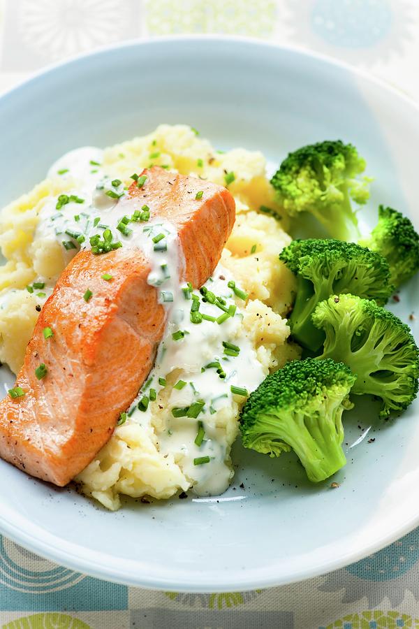 Salmon With A Chive Sauce, Broccoli And Mashed Potato Photograph by Jonathan Short