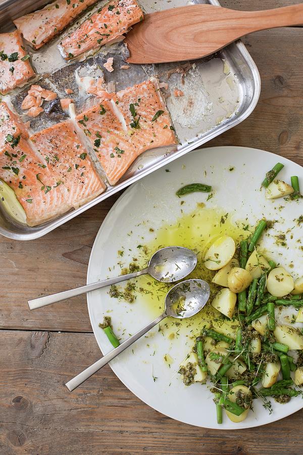 Salmon With Asparagus And Potatoes Photograph by Sabine Steffens