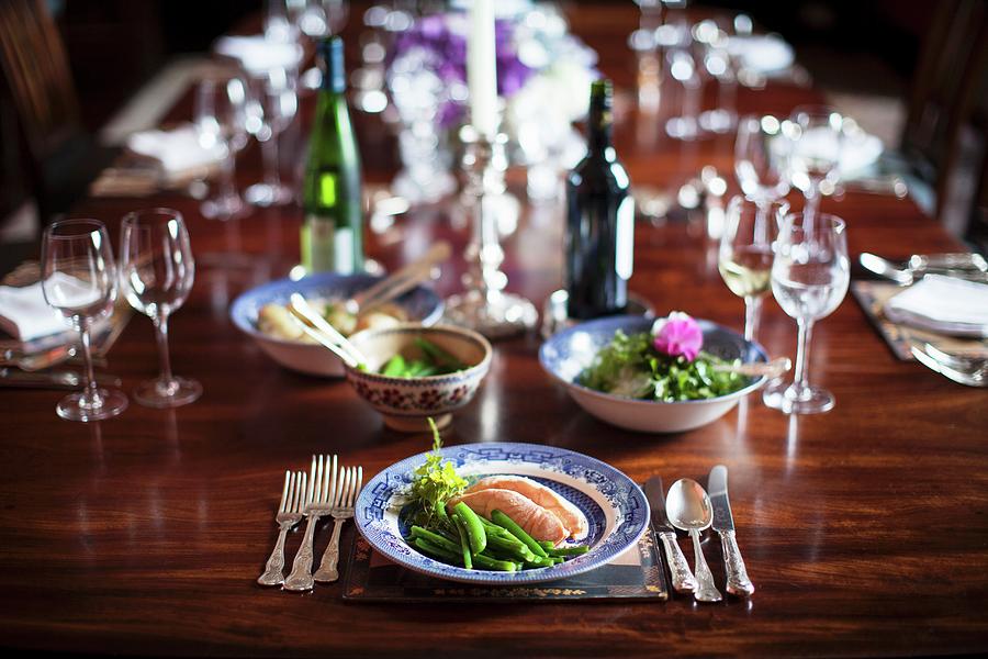 Salmon With Green Beans On A Festively Laid Table Photograph by Helen Cathcart