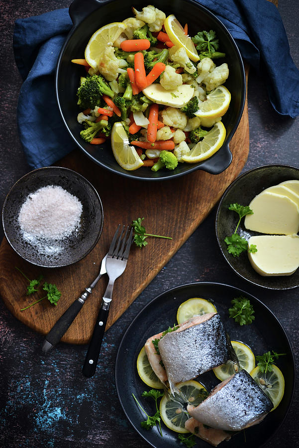 Salmon With Lemons And Steamed Vegetables A Healthy Dish Photograph by Karolina Smyk