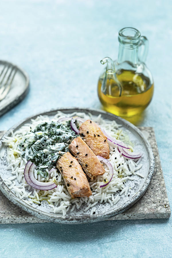Salmon With Spinach And Rice Photograph by Monika Grabkowska