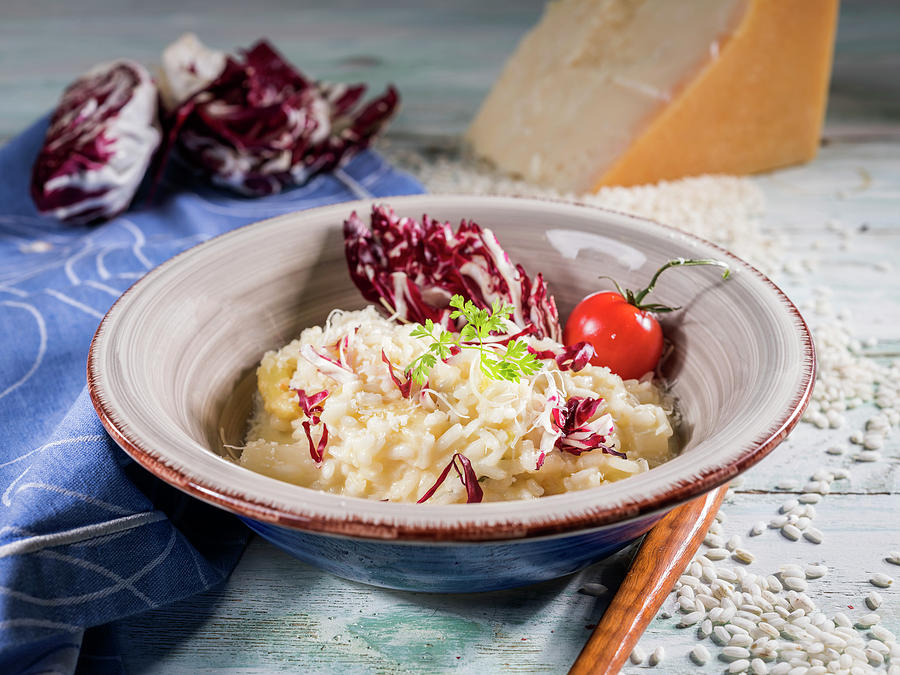 Salsify Risotto With Radicchio, Cherry Tomato, Chervil And Parmesan Photograph by Niklas Thiemann