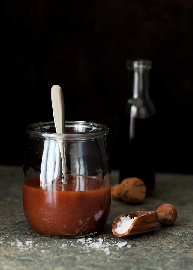Salted Caramel Sauce With Sea Salt Flakes Photograph by Jane Saunders