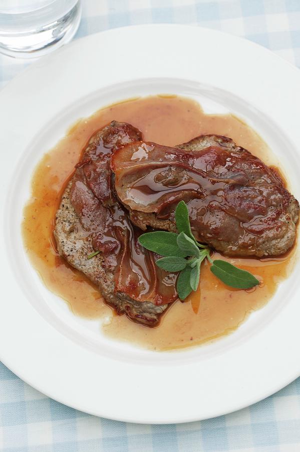 Saltimbocca Alla Romana Made With Saddle Of Venison With Sage And Parma Ham Photograph by Food Experts Group