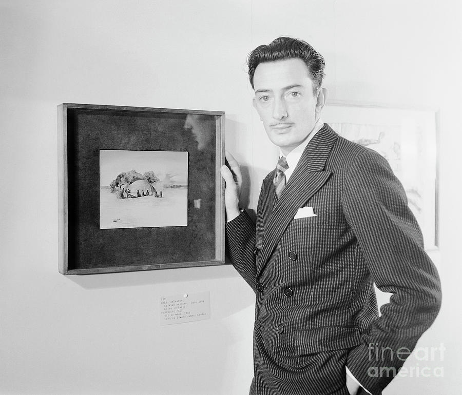 Salvador Dali Standing By Framed Picture Photograph by Bettmann