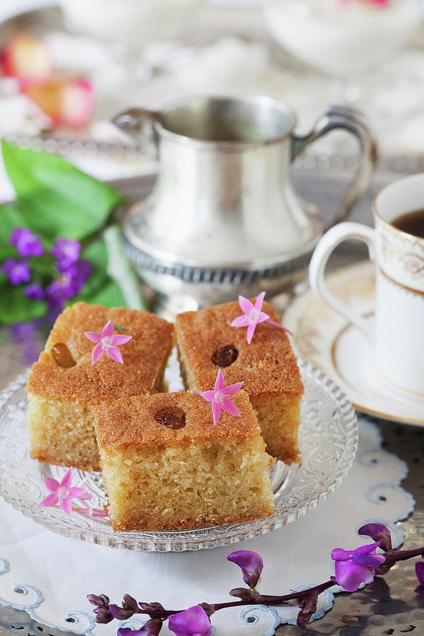 Samolina Cake On A Silver Tray With Cup Of Coffee And Flowers Photograph by Yelena Strokin