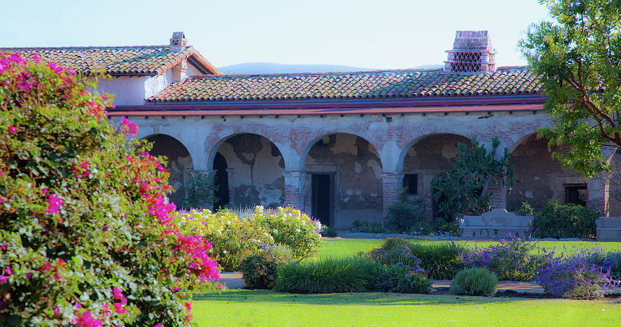 San Juan Capistrano California Mission with Arches and Flowers Photograph by Catherine Walters
