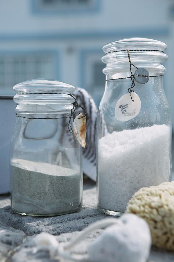 Sand And White Gravel In Preserving Jars With Fine Wires On Lids