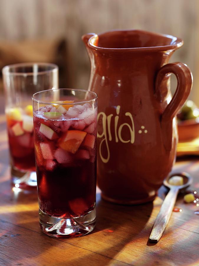 Sangria In Glasses And An Earthenware Jug Photograph by Ian Garlick