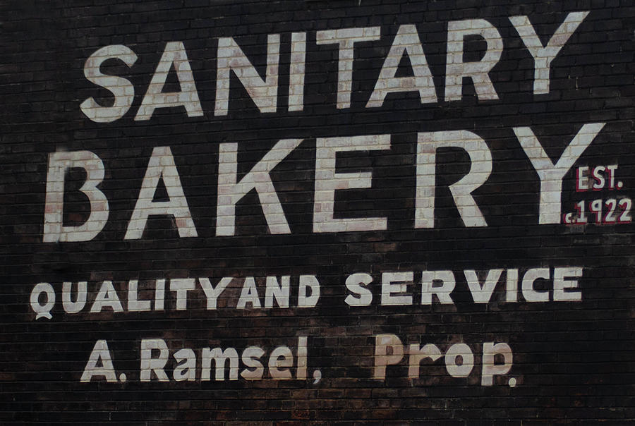 Sanitary Bakery Sign Hand Painted On Brick Photograph by Patrick Nowotny