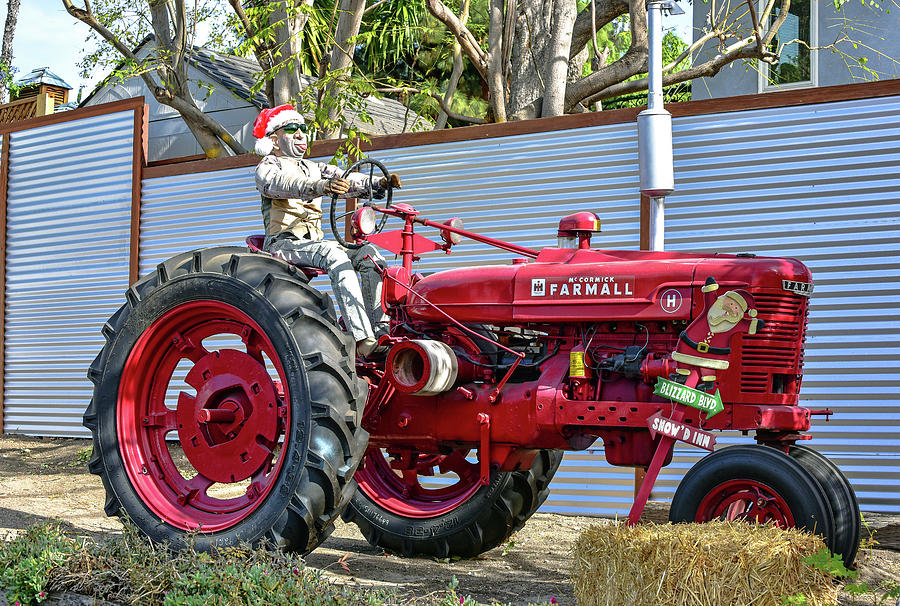 Santa On a Tractor with Tongue Sticking Out 1  Photograph by Linda Brody