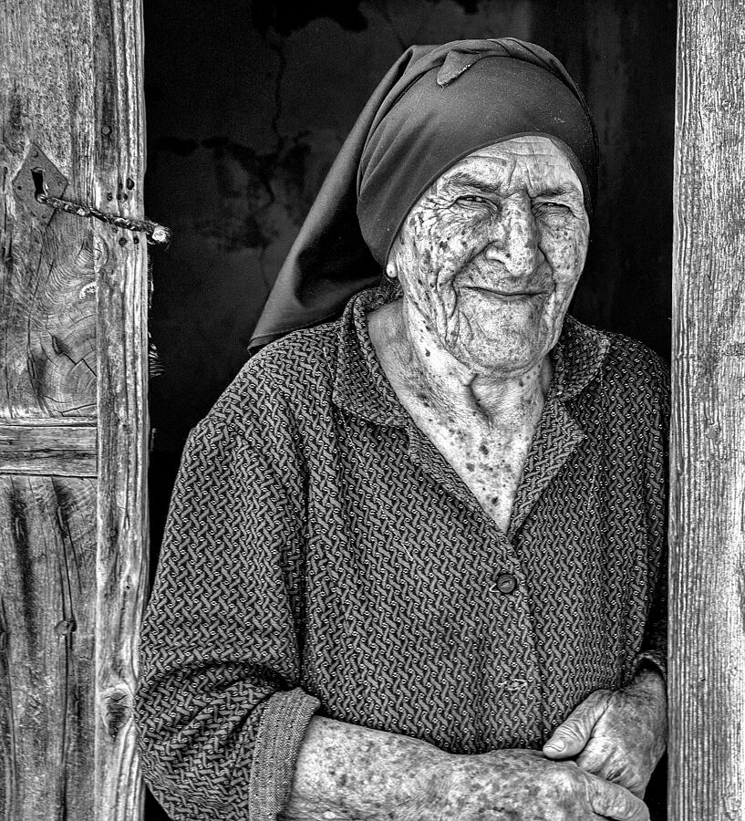Santorini Lady Photograph by Peter Paterson
