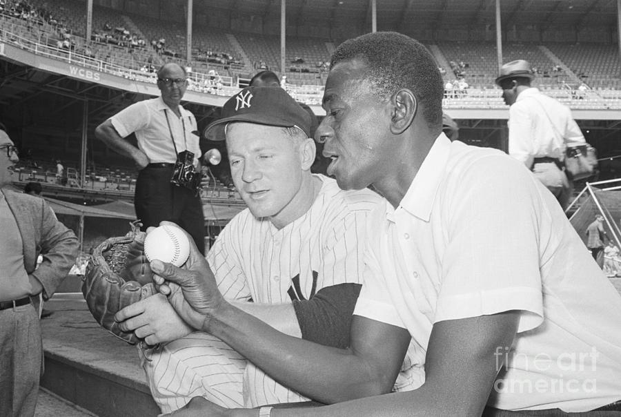 Satchel Paige Pitching For Kansas City by Bettmann