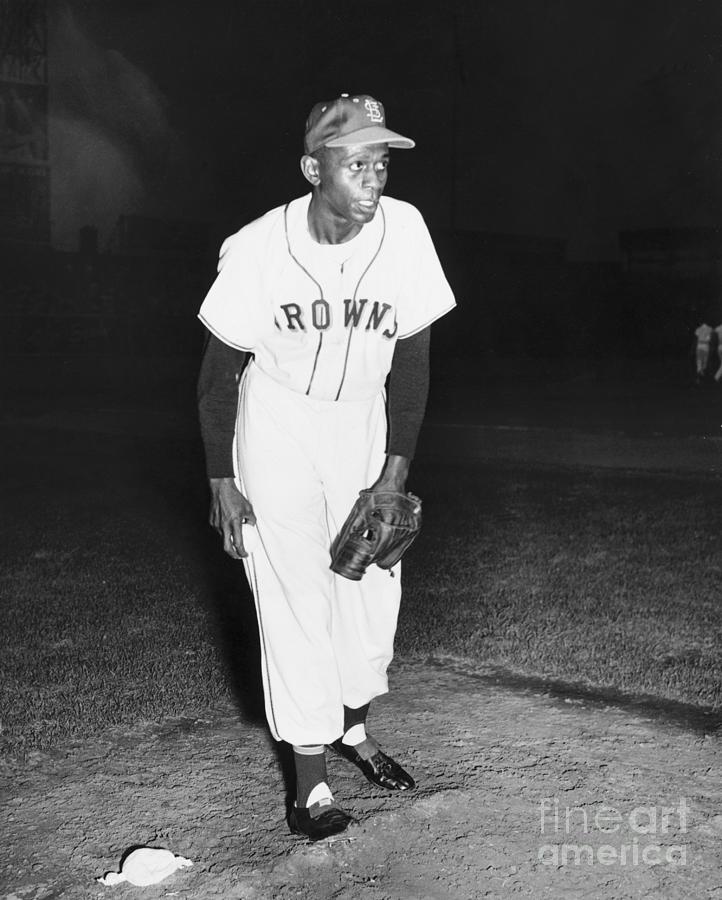 Satchel Paige Pitching For St. Louis by Bettmann