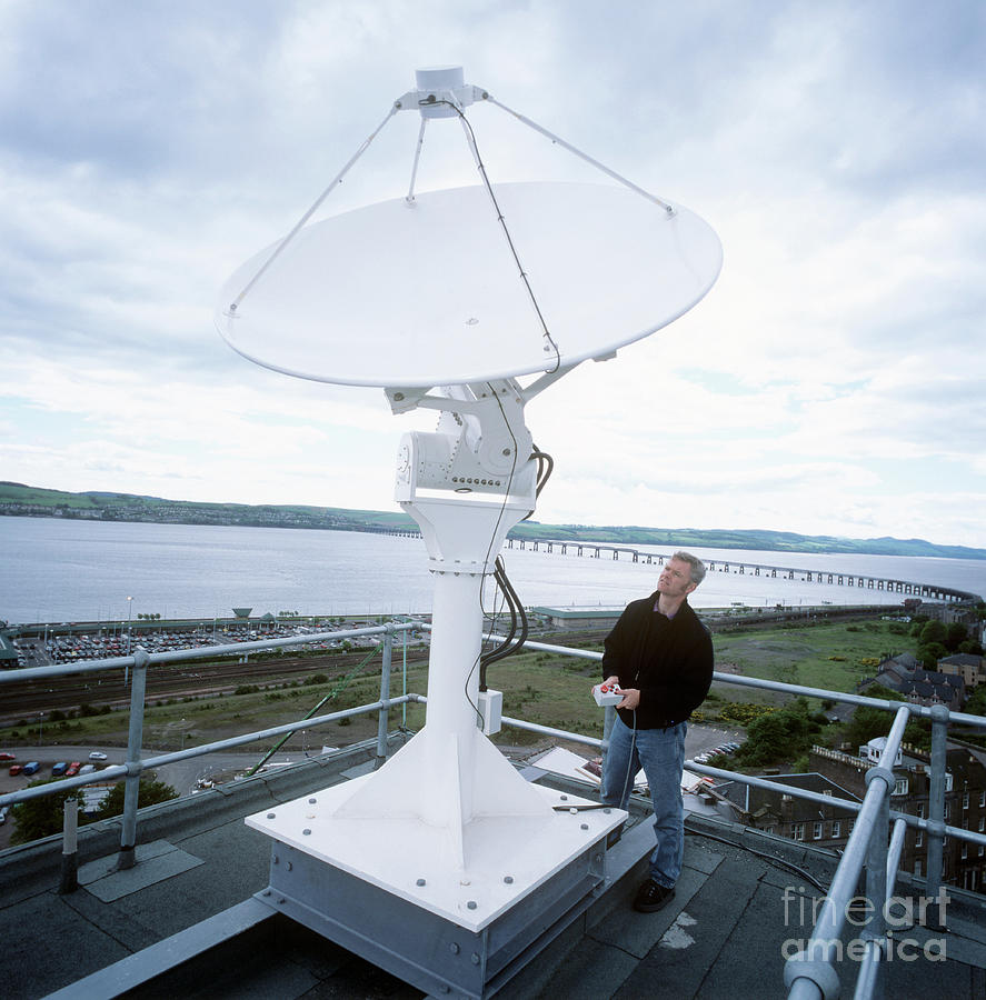 Satellite Dish Adjustment Photograph by Brian Bell/science Photo Library