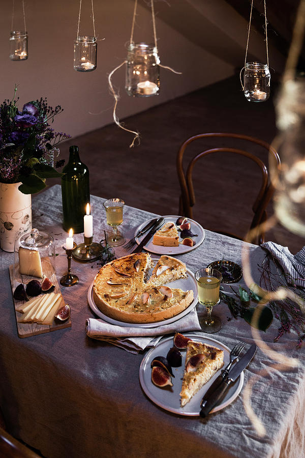 Sauerkraut Quiche With Apples On A Festively Laid Table For Two Photograph by Emmer Flora