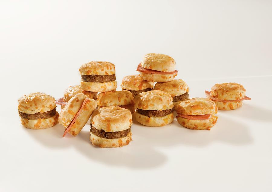 Sausage And Ham On American Cheese Biscuits Photograph by Colin Cooke