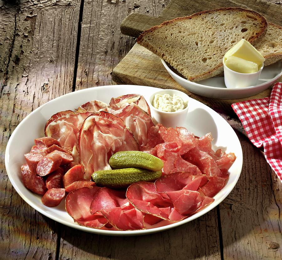 Sausage And Ham Platter With Pickled Gherkins, Bread And Butter Photograph by Foodfoto Kln