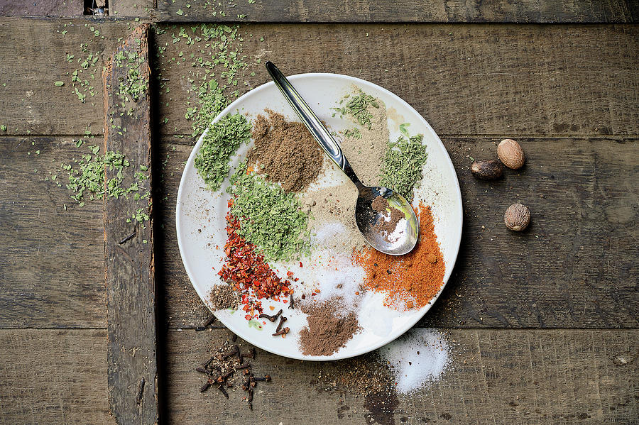 Sausages Being Made: Various Spices And Herbs On A Plate Photograph by Torri Tre