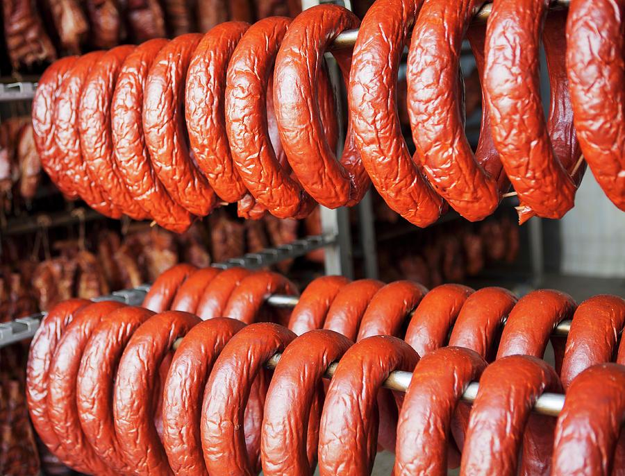 Sausages Hanging In A Smokehouse Photograph by Pawel Worytko