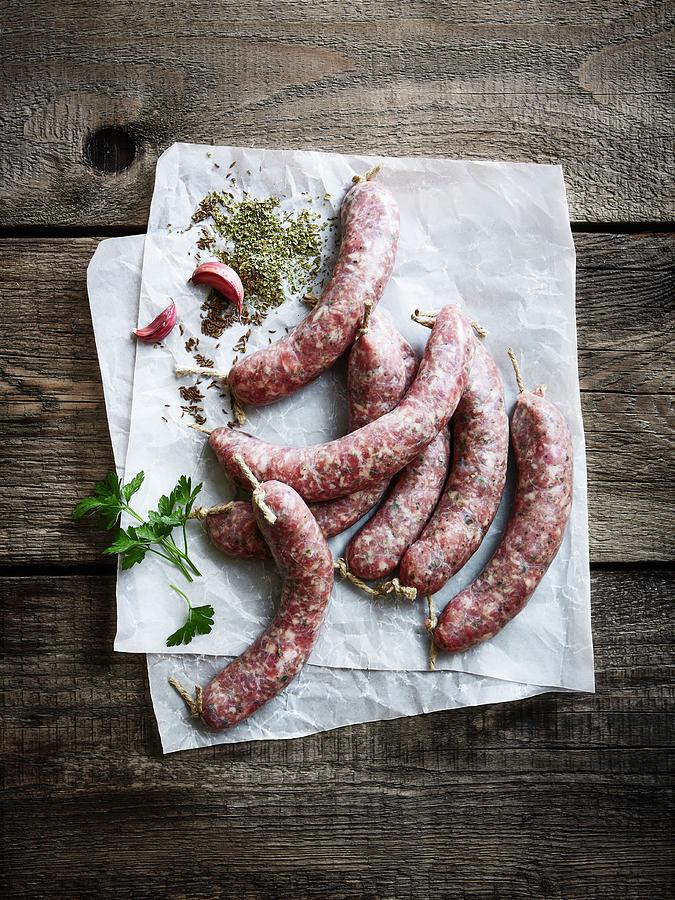 Sausages On A Piece Of Paper Photograph by Thorsten Kleine Holthaus