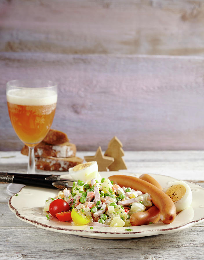 Sausages, Potato Salad With Diced Vegetables, Peas And Mayonnaise And A Hard-boiled Egg Photograph by Teubner Foodfoto