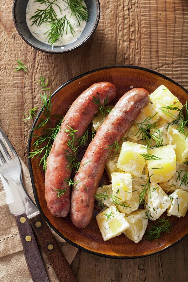 Sausages With Potato Salad And Dill Photograph by Olga Miltsova