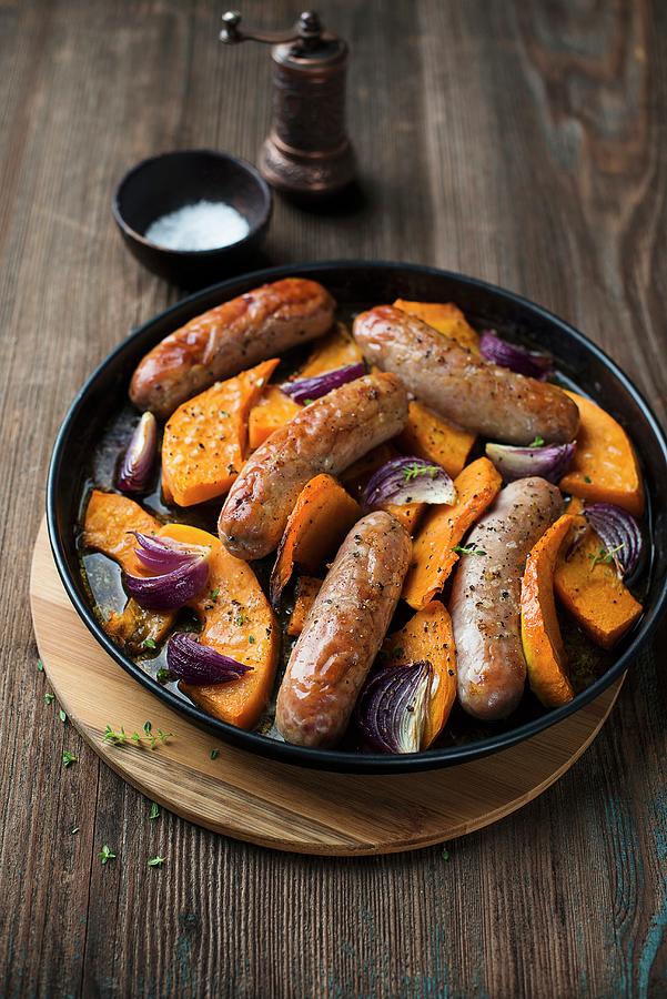 Sausages With Pumpkin And Onions Photograph by Ewgenija Schall