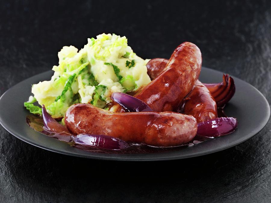 Sausages With Red Onion Gravy And Colcannon mashed Potatoes With Green