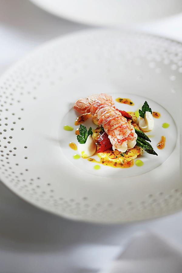 Sauted Langoustine On A Bed Of Cauliflower In An Orange And Saffron Reduction And Parsley Oil Photograph by Jalag / Markus Bassler