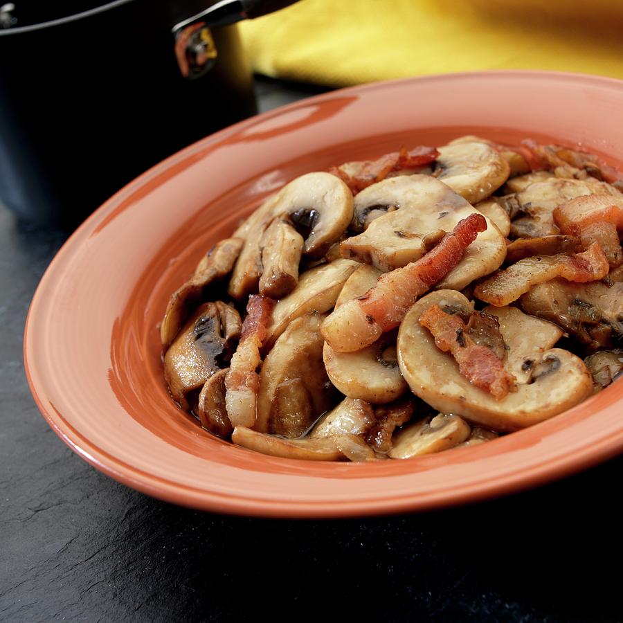 Sauted Mushrooms With Bacon Strips Photograph by Paul Poplis