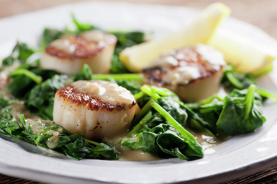 Sauteed Scallops On Spinach close Up Photograph by Framed Cooks Photography