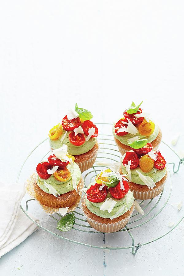 Savoury Cupcakes With Basil & Marscarpone Cream And Caramelised Tomatoes Photograph by Jalag / Mathias Neubauer