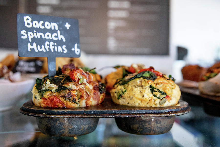 Savoury Muffins With Bacon And Spinach On A Restaurant Counter Photograph by Claudia Timmann