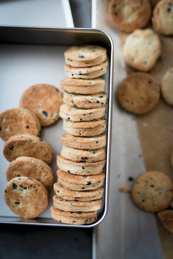Savoury Olive Biscuits In A Biscuit Tin Photograph by Manuela Rther