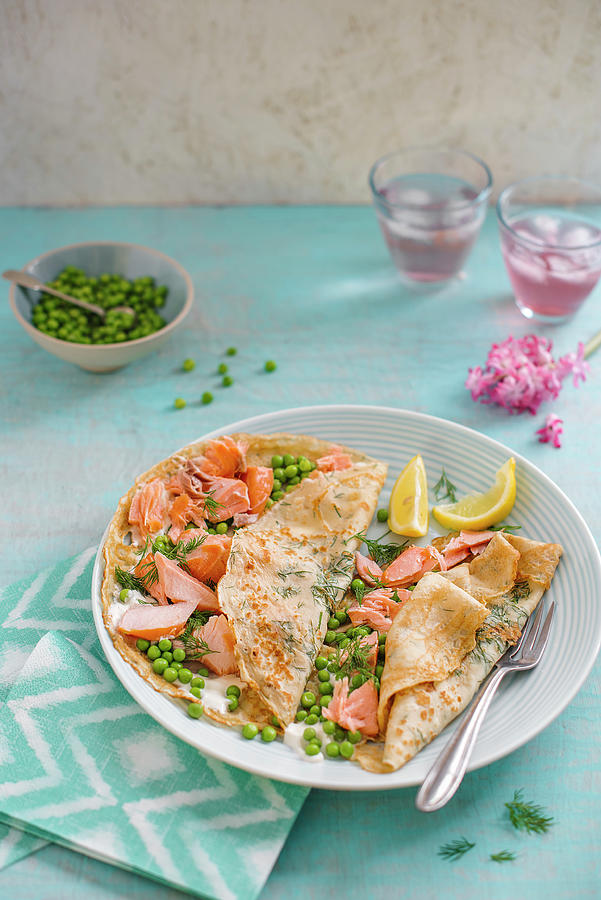 Savoury Pancakes With Dill Salmon, Sour Creme And Peas Photograph by Magdalena Hendey