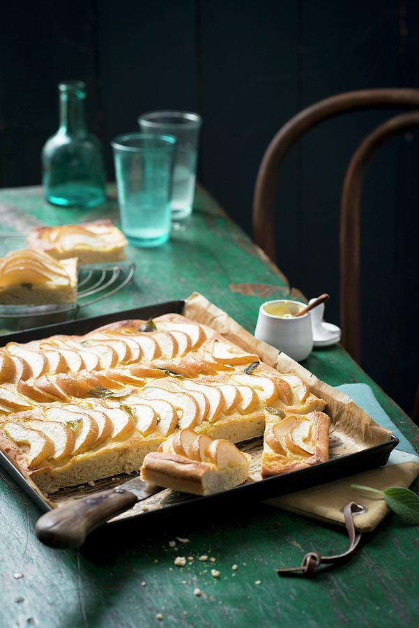 Savoury Pear And Mustard Cake On A Baking Tray Photograph by Manuela Rther
