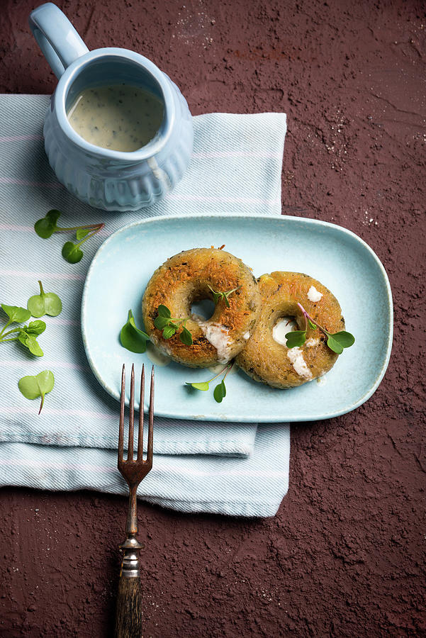 Savoury Potato Doughnuts With A Herb Sauce Photograph by Kati Neudert