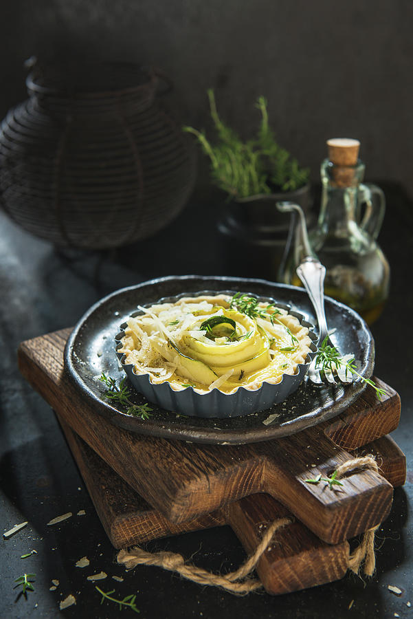 Savoury Tartlet With Courgette And Parmesan In A Baking Dish Photograph by Aleksandra Kordalska