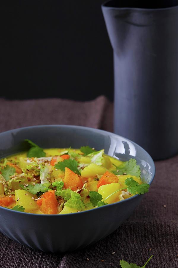 Savoy Cabbage And Potato Curry Photograph by Misha Vetter
