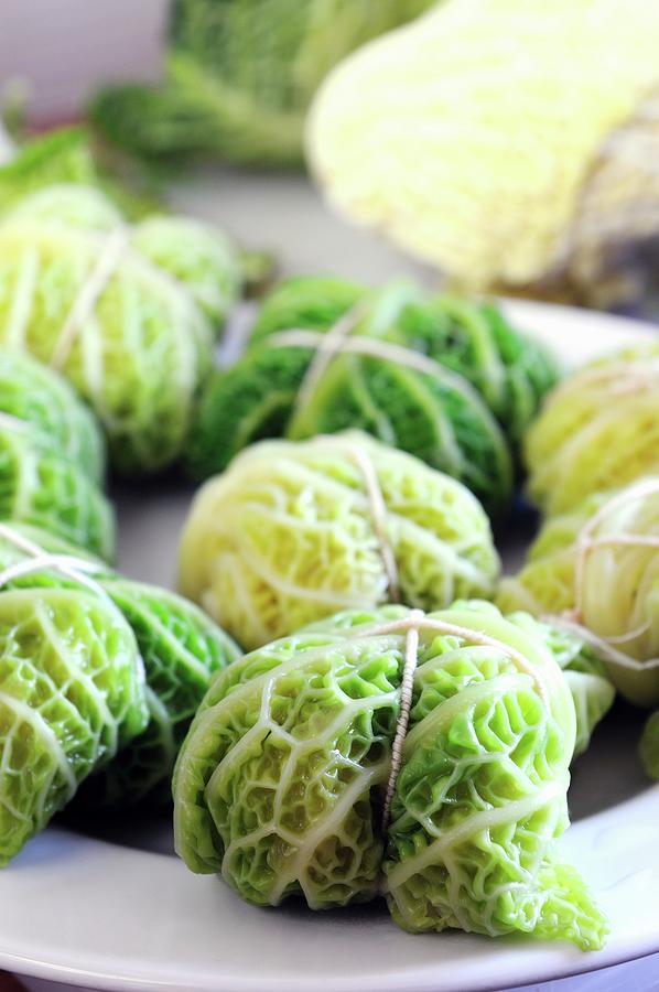 Cabbage Photograph - Savoy Cabbage Parcels raw by Mario Matassa