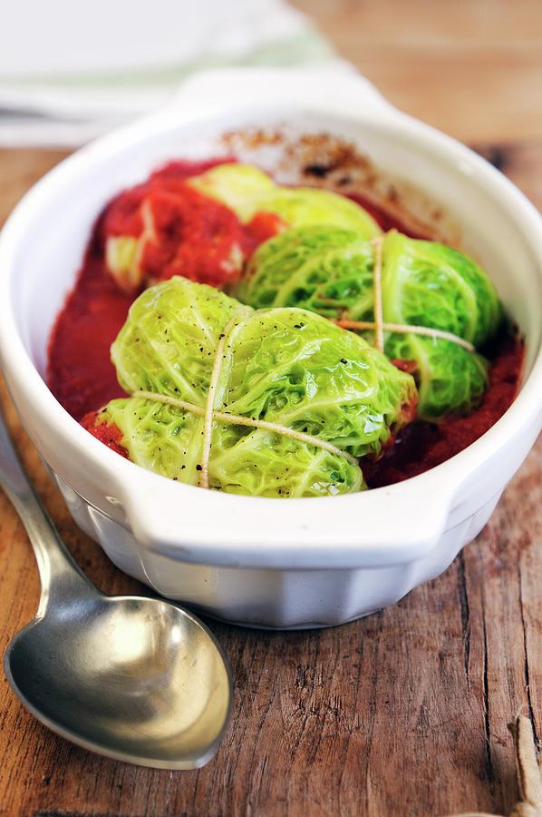 Savoy Cabbage Parcels With Tomato Sauce Photograph by Mario Matassa