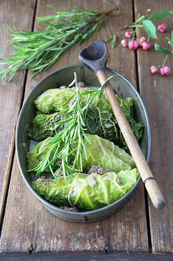 Savoy Cabbage Roulades With A Quince And Minced Meat Filling Photograph by Martina Schindler