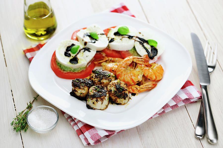 Scallops with Blackening Spice + Prawns With Caprese Salad And Green Pesto Photograph by Ina Peters