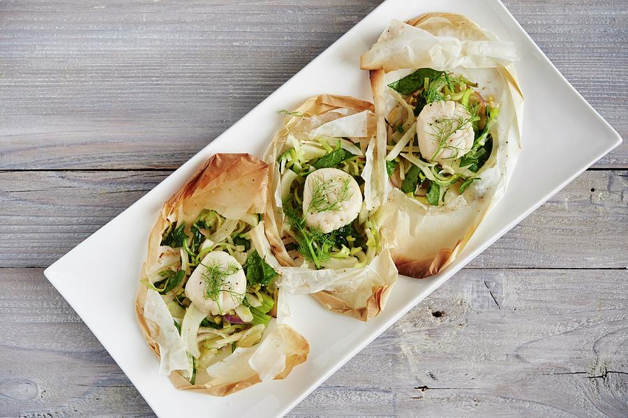 Scallops With Leek, Fennel And White Wine In Parchment Paper Photograph by Greg Rannells